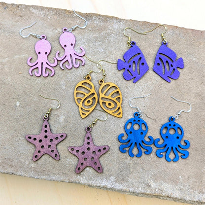 LAW Ocean Lederohrringe – Federleicht. Funkelnd. Voller Charakter.